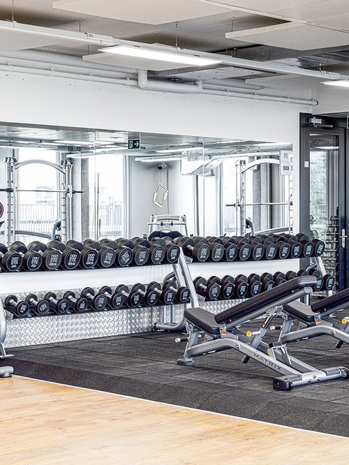 Architecture d'intérieur et transformation de CCHE pour le Fitness NonStop Gym à Malley Suisse
